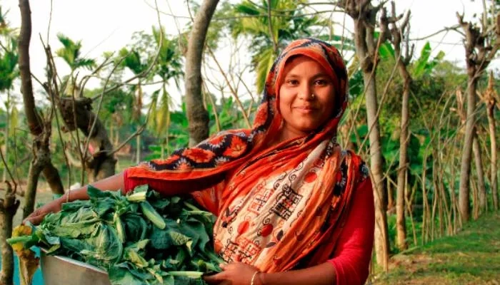 Women holding plants